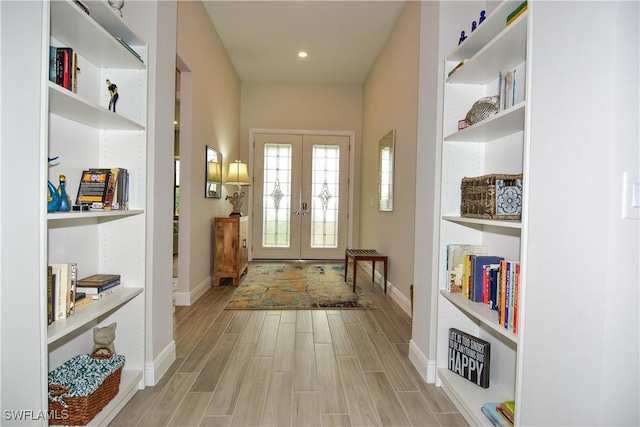 interior space featuring french doors and light wood-type flooring