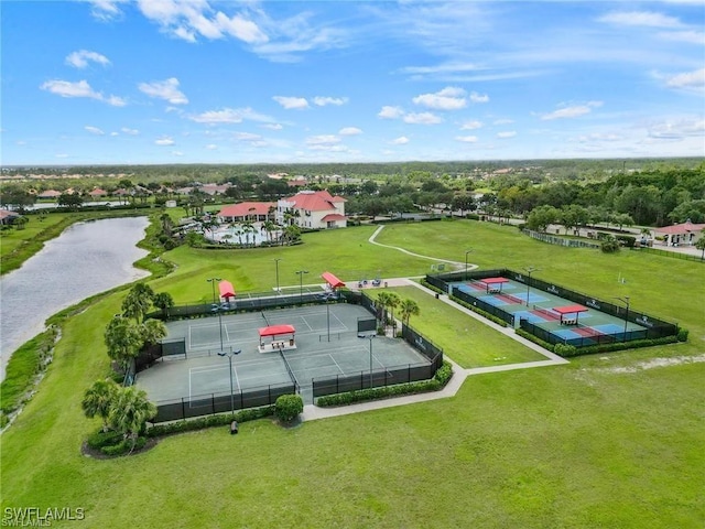 birds eye view of property featuring a water view