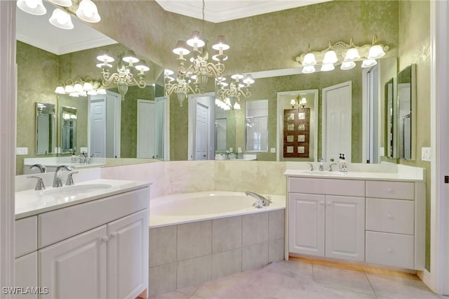 bathroom with ornamental molding, vanity, tiled tub, tile patterned flooring, and a chandelier