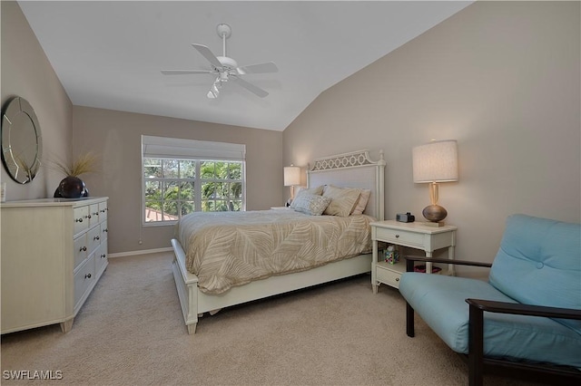 carpeted bedroom featuring ceiling fan and lofted ceiling