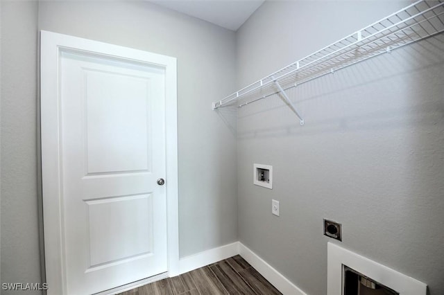 laundry room featuring electric dryer hookup, dark wood-type flooring, and washer hookup