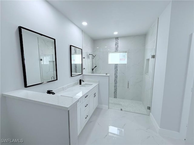 bathroom with vanity and walk in shower