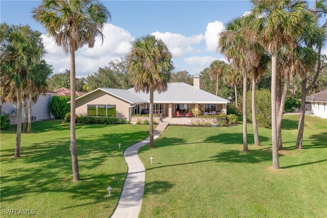 ranch-style home featuring a front yard