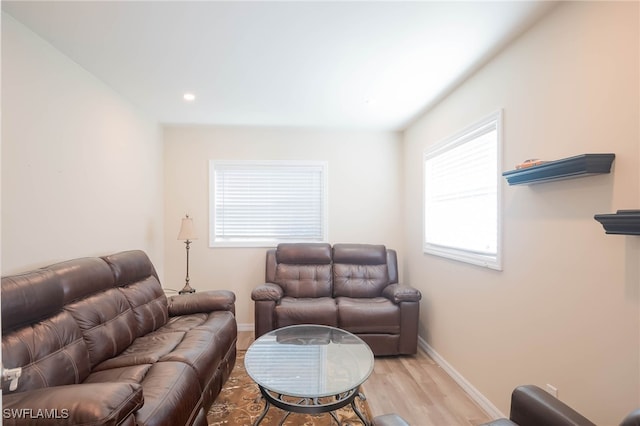 living room with light hardwood / wood-style floors