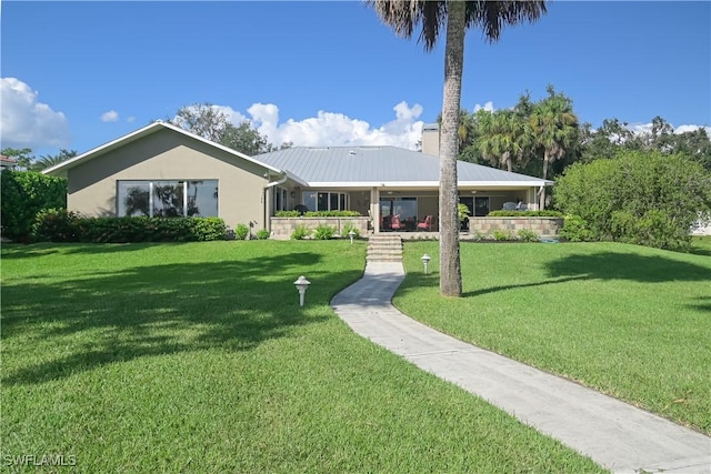 ranch-style house with a front lawn