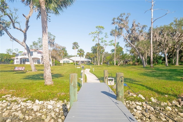 dock area featuring a yard