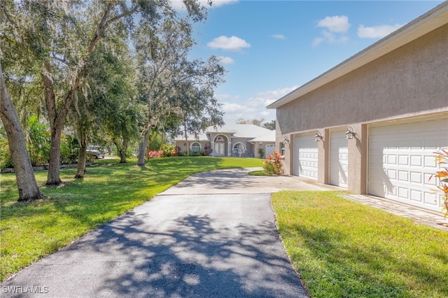 view of yard with a garage