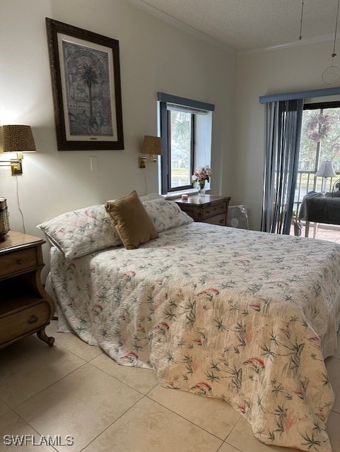 tiled bedroom with access to exterior and ornamental molding