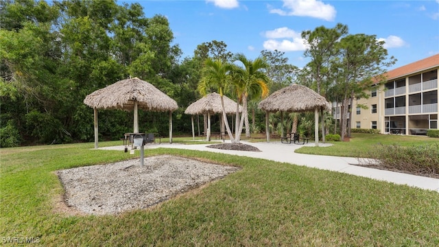 view of community with a gazebo and a lawn