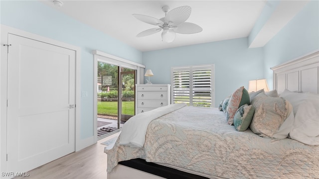 bedroom featuring ceiling fan, access to exterior, and light wood-type flooring