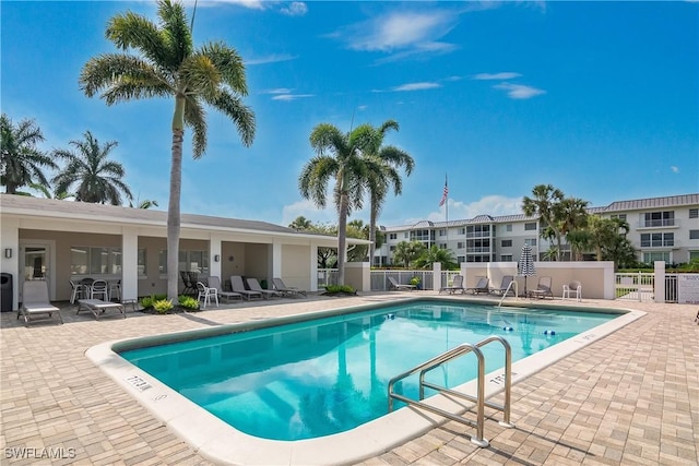 view of swimming pool featuring a patio