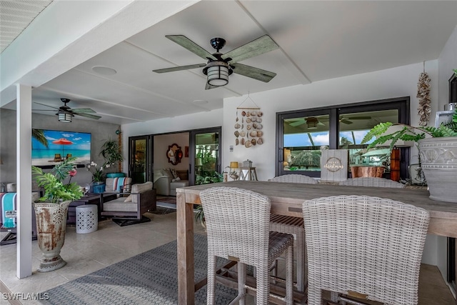 dining space with ceiling fan