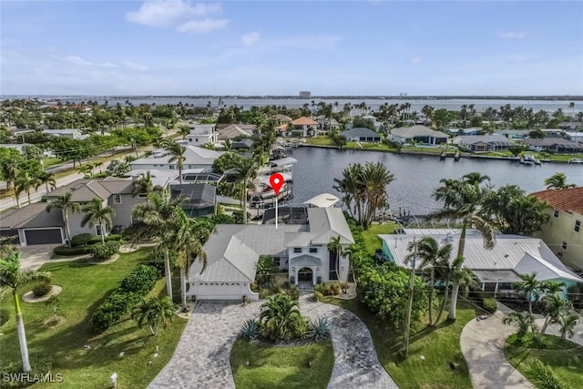 drone / aerial view featuring a water view