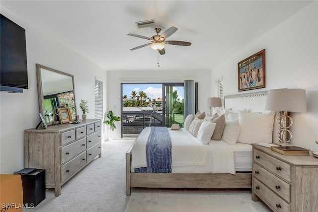 bedroom featuring access to outside, ceiling fan, and light colored carpet