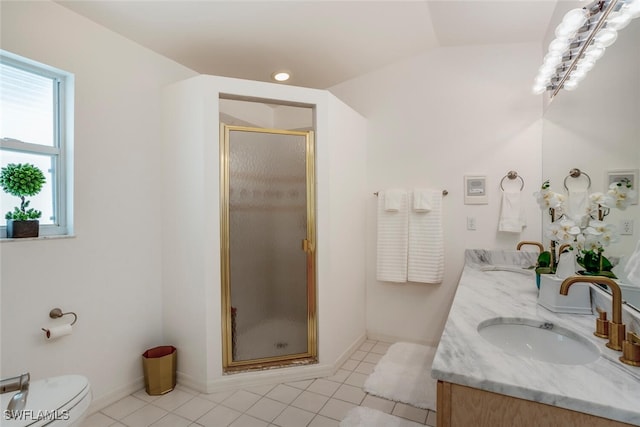 bathroom with tile patterned flooring, vanity, a shower with shower door, and lofted ceiling