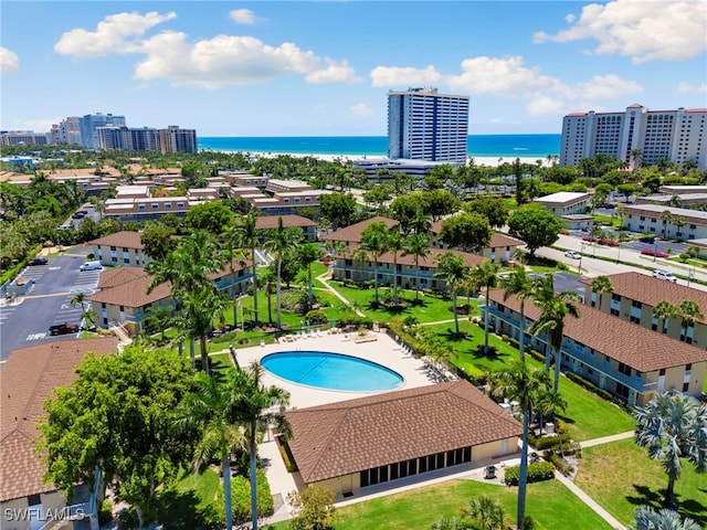 birds eye view of property featuring a water view