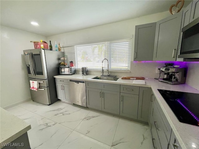 kitchen featuring appliances with stainless steel finishes and sink