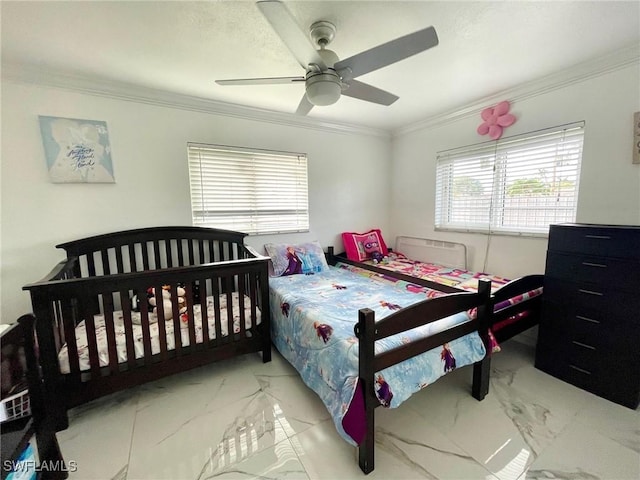 bedroom with ceiling fan and crown molding