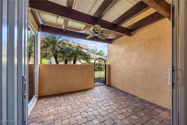 balcony featuring ceiling fan