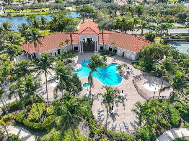 view of pool featuring a water view