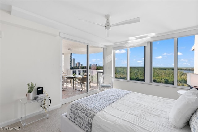 bedroom with carpet flooring, ceiling fan, and access to exterior