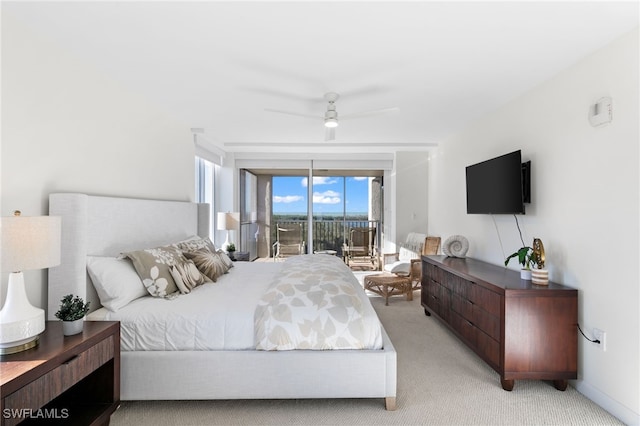 carpeted bedroom featuring ceiling fan and access to outside