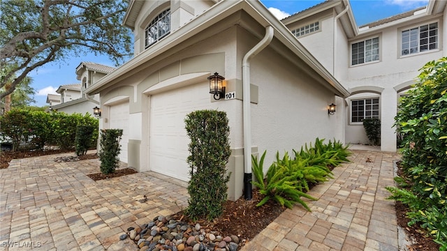 property entrance with a garage