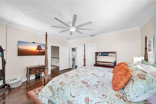 bedroom with crown molding, ceiling fan, and dark wood-type flooring