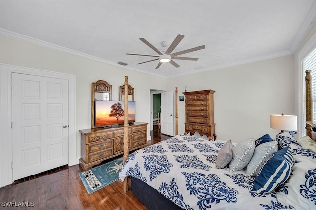 bedroom with ceiling fan, dark hardwood / wood-style flooring, and crown molding