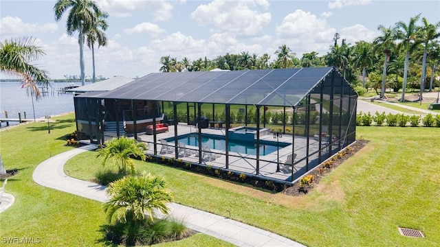 view of pool with a lawn, a patio area, a water view, and an outdoor hangout area