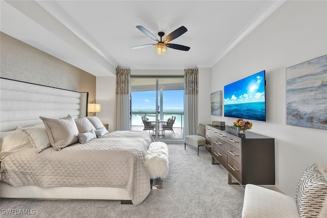 carpeted bedroom with crown molding and ceiling fan