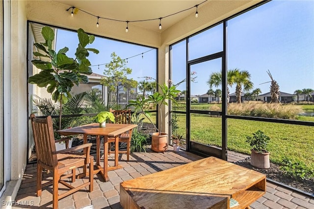 sunroom / solarium with a healthy amount of sunlight