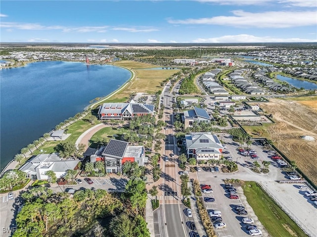 drone / aerial view featuring a water view