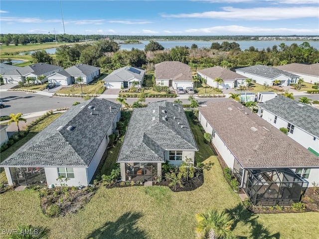 bird's eye view with a water view