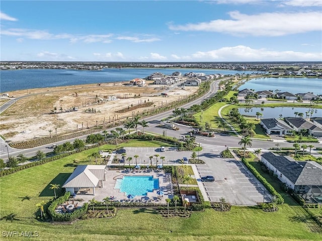 birds eye view of property featuring a water view