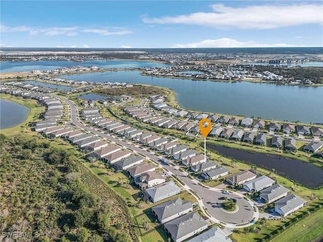 drone / aerial view with a water view