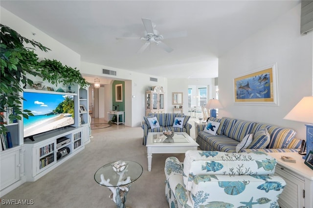 living room featuring light carpet and ceiling fan