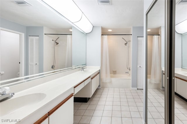 full bathroom featuring tile patterned floors, vanity, shower / bath combination with curtain, and toilet