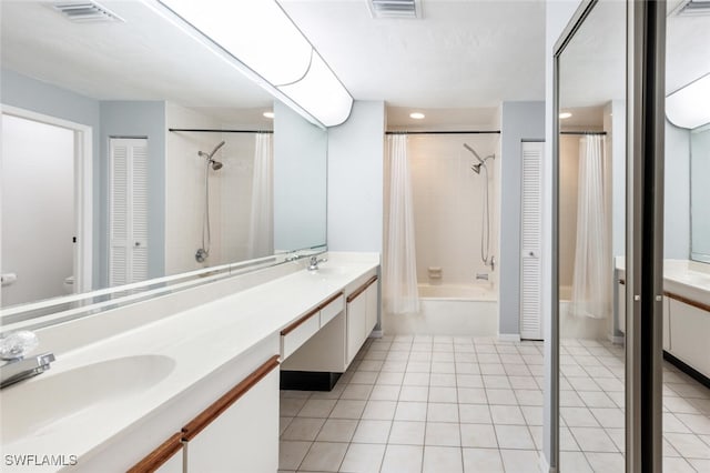 907 Reef Point Cir, Naples, FL 34108 - bathroom featuring double vanity, a closet, shower / bathtub combination with curtain, tile patterned floors, and recessed lighting