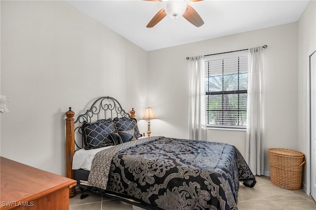 bedroom featuring ceiling fan and light tile patterned floors