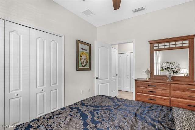 bedroom with ceiling fan and a closet