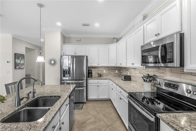 kitchen with white cabinetry, sink, light stone counters, pendant lighting, and appliances with stainless steel finishes