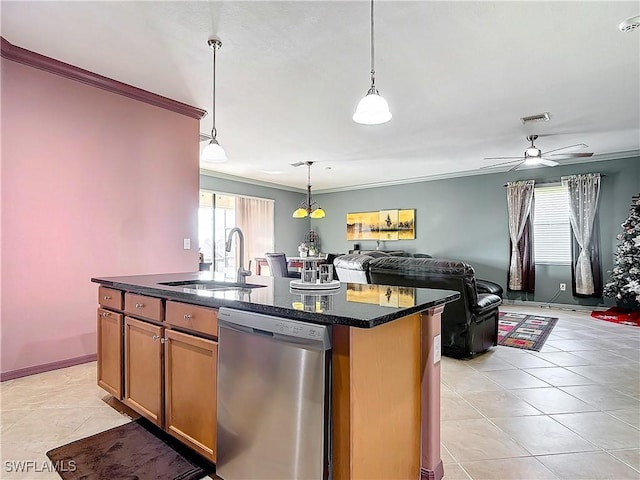 kitchen with ceiling fan, sink, stainless steel dishwasher, crown molding, and an island with sink