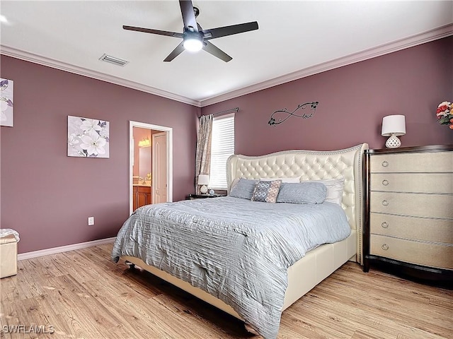 bedroom featuring ensuite bath, ceiling fan, crown molding, and light hardwood / wood-style floors