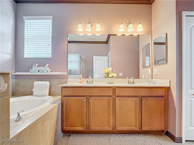 bathroom featuring tile patterned flooring, a relaxing tiled tub, ornamental molding, and vanity