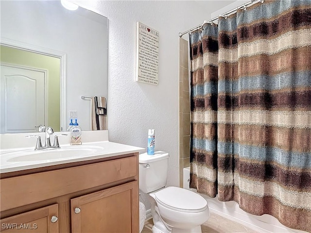 full bathroom featuring tile patterned floors, vanity, shower / bathtub combination with curtain, and toilet