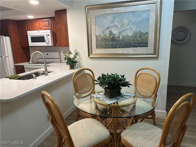 dining room featuring dark hardwood / wood-style floors