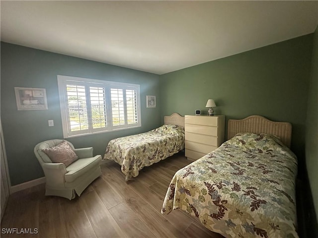 bedroom featuring hardwood / wood-style floors