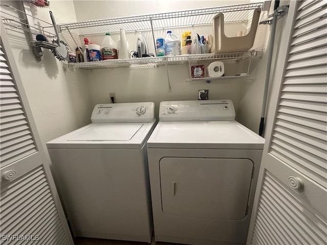 washroom featuring separate washer and dryer