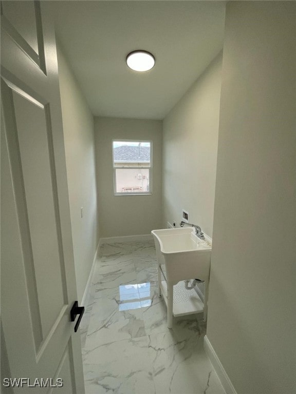 6024 Joplin Ave, Fort Myers, FL 33905 - bathroom featuring marble finish floor and baseboards
